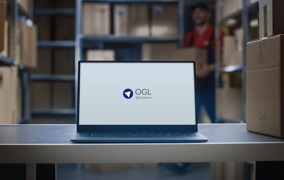 OGL Software laptop in a warehouse